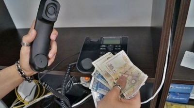 Криминалисти задържаха извършители на телефонни измами 